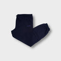 Adidas blue sweatpants with small purple embroidered trefoil logo