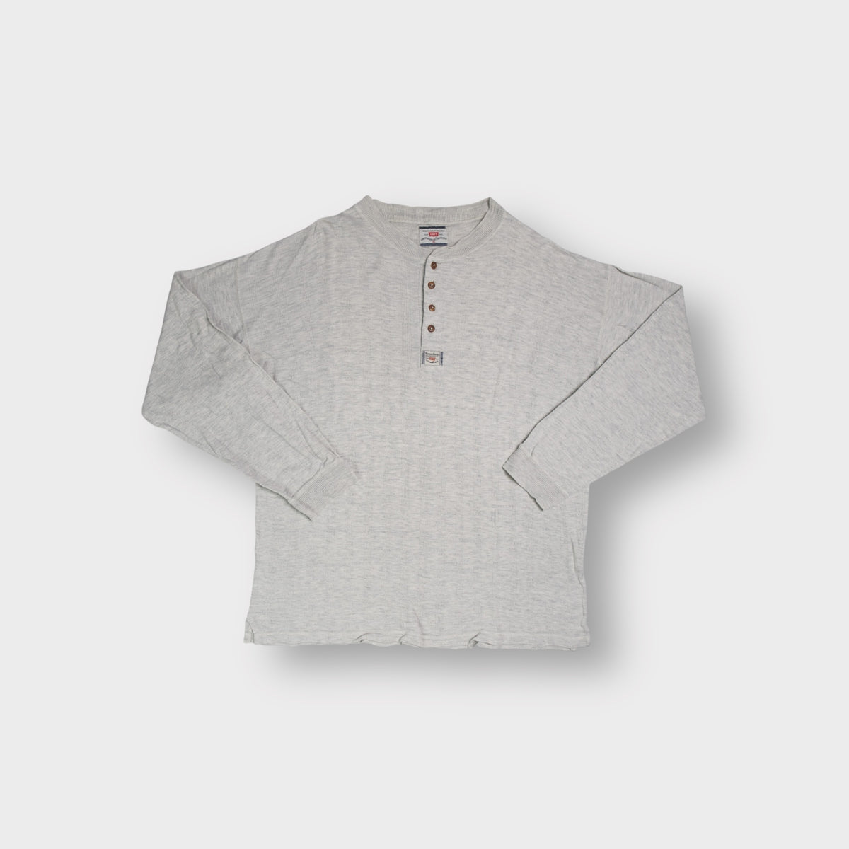 Levi's grey henley sweater with four front buttons and a small logo patch