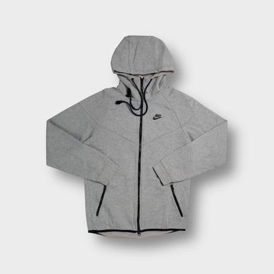 Grey Nike Tech zip-up hoodie with printed chest logo and high neck hood