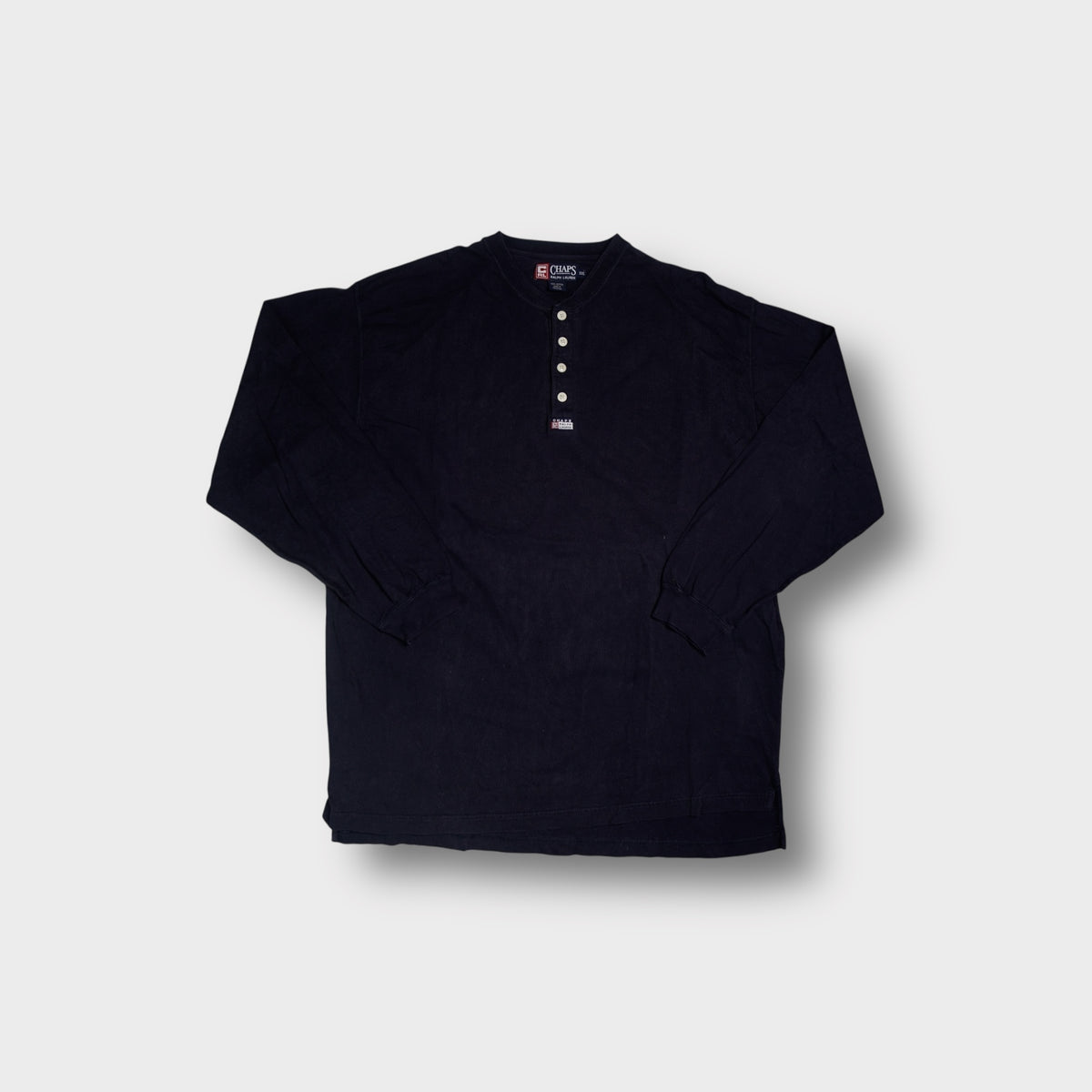 Chaps Ralph Lauren sweater in navy blue featuring a buttoned henley neck and small woven patch