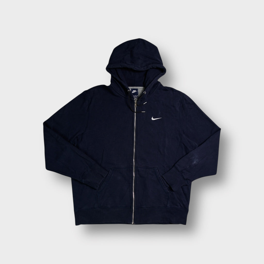 Nike zip hoodie in navy blue with a small white embroidered swoosh on the chest