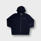 Nike zip hoodie in navy blue with a small white embroidered swoosh on the chest