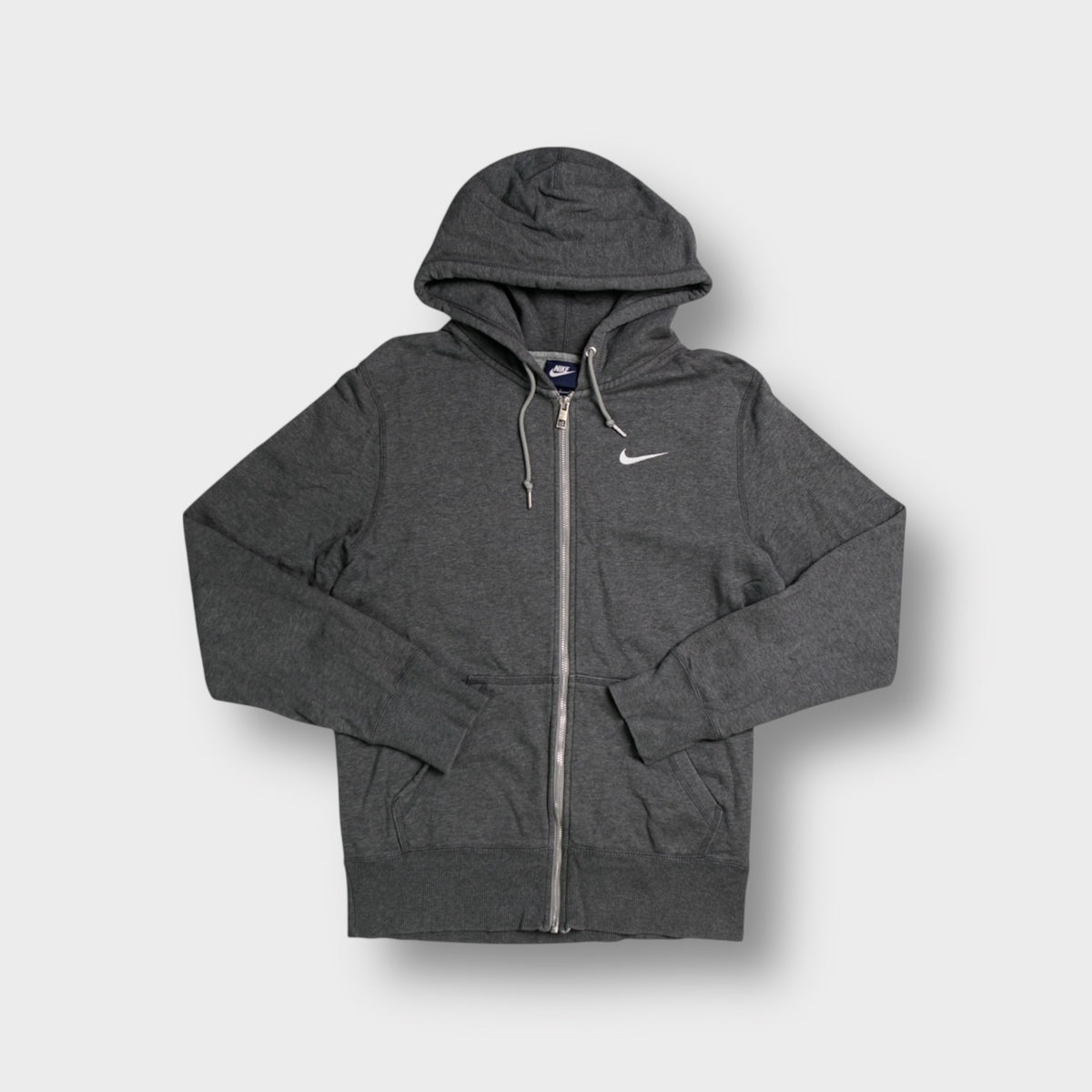 Nike full-zip hoodie in grey with an embroidered white swoosh on the chest
