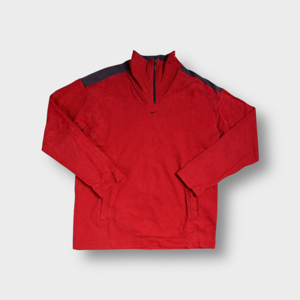 Nike sweater in red with black shoulder accents and small embroidered chest swoosh.