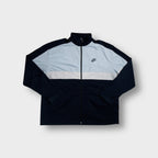 Nike track jacket in blue with light blue panel and embroidered chest logo