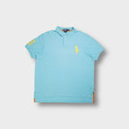 Ralph Lauren polo shirt in turquoise featuring yellow Big Pony embroidery on chest