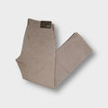 Beige Joker jeans with a leather waist patch and double saddle stitching