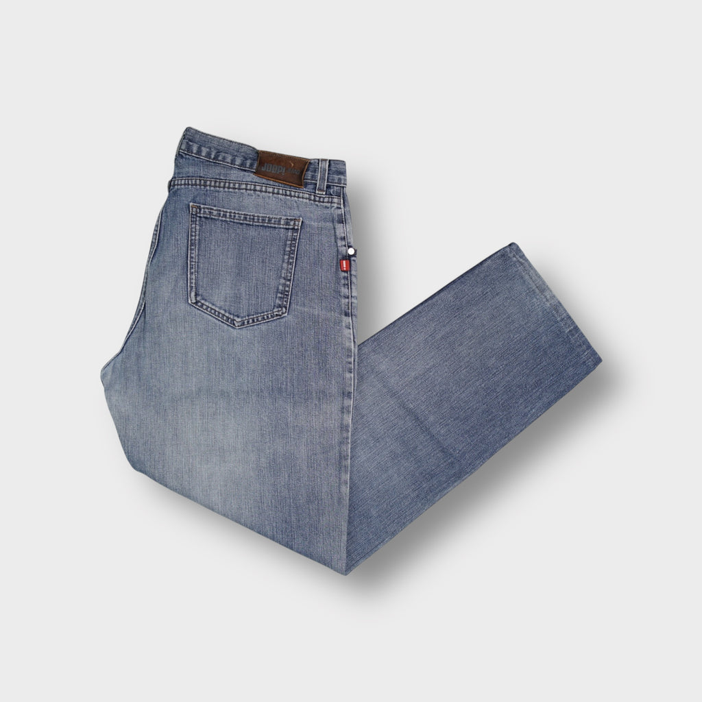 Joop blue denim jeans featuring a dark brown leather waistband patch on the back