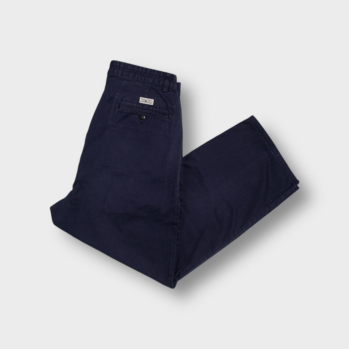 Ralph Lauren navy blue pants featuring a rear pocket with Polo Chino patch label.