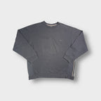 Nike grey crewneck sweater featuring a small embroidered swoosh logo on the chest
