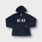 Nike full-zip hoodie in navy blue featuring white applique lettering across the chest.