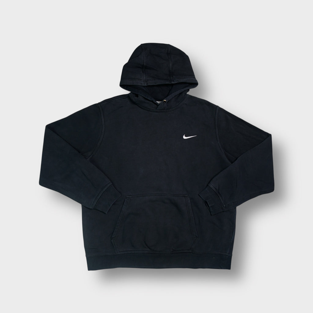 Nike hoodie in black with a small white embroidered swoosh on the chest.