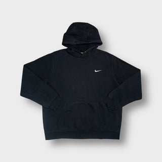 Nike hoodie in black with a small white embroidered swoosh on the chest.