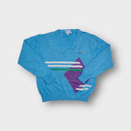 Lacoste V-neck knit sweater in light blue featuring a purple geometric graphic chest pattern