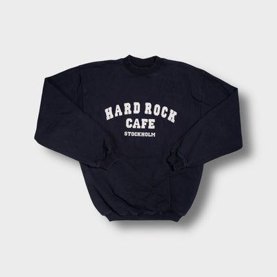 Hard Rock Cafe navy blue sweater with white Stockholm arch logo text across chest