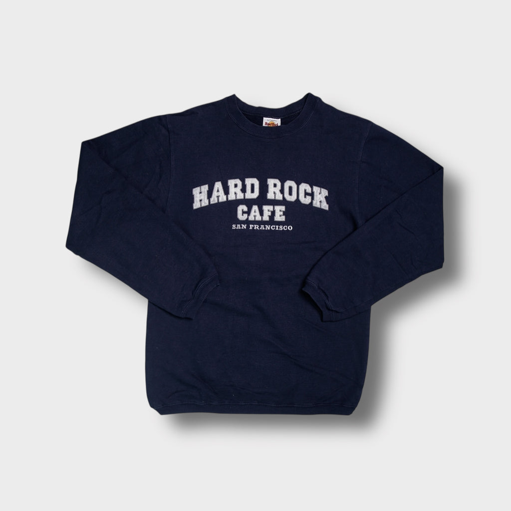 Hard Rock Cafe sweater in navy blue with San Francisco lettering embroidered on the chest.