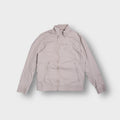 G-Star jacket in beige featuring zipped front pockets and a high collar