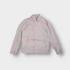G-Star jacket in beige featuring zipped front pockets and a high collar