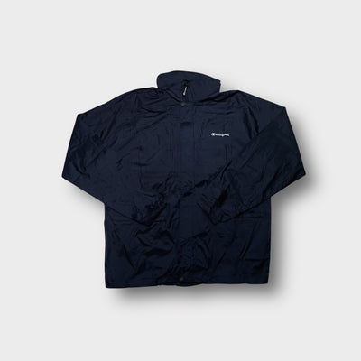 Champion windbreaker jacket in navy blue with white embroidered chest logo