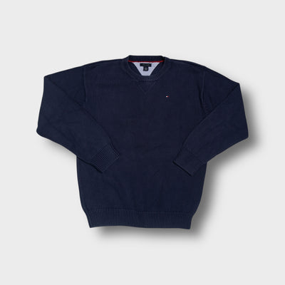 Tommy Hilfiger crew neck sweater in blue with an embroidered flag logo on the chest