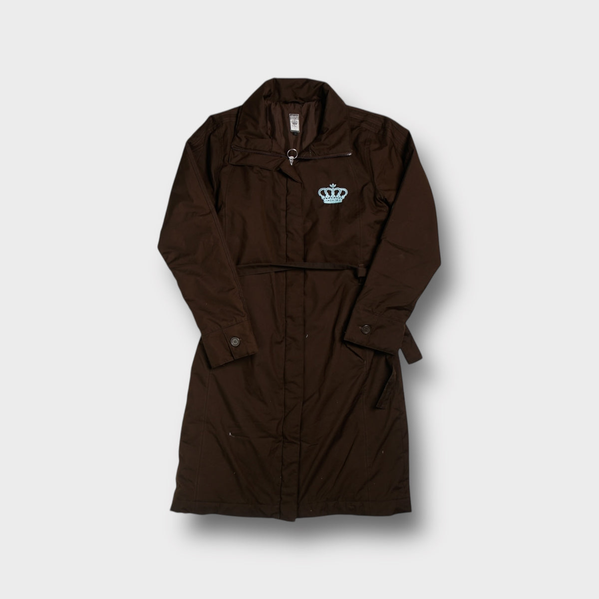 Brown Adidas Respect Me jacket featuring light blue embroidered crown on chest