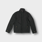 Tommy Hilfiger dark grey jacket featuring a fleece-lined collar and embroidered chest logo