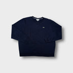 Lacoste Sport crewneck sweater in navy blue with an embroidered crocodile patch on the chest.