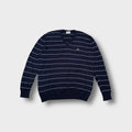 Lacoste knit sweater in navy blue featuring white horizontal stripes and a V-neck.