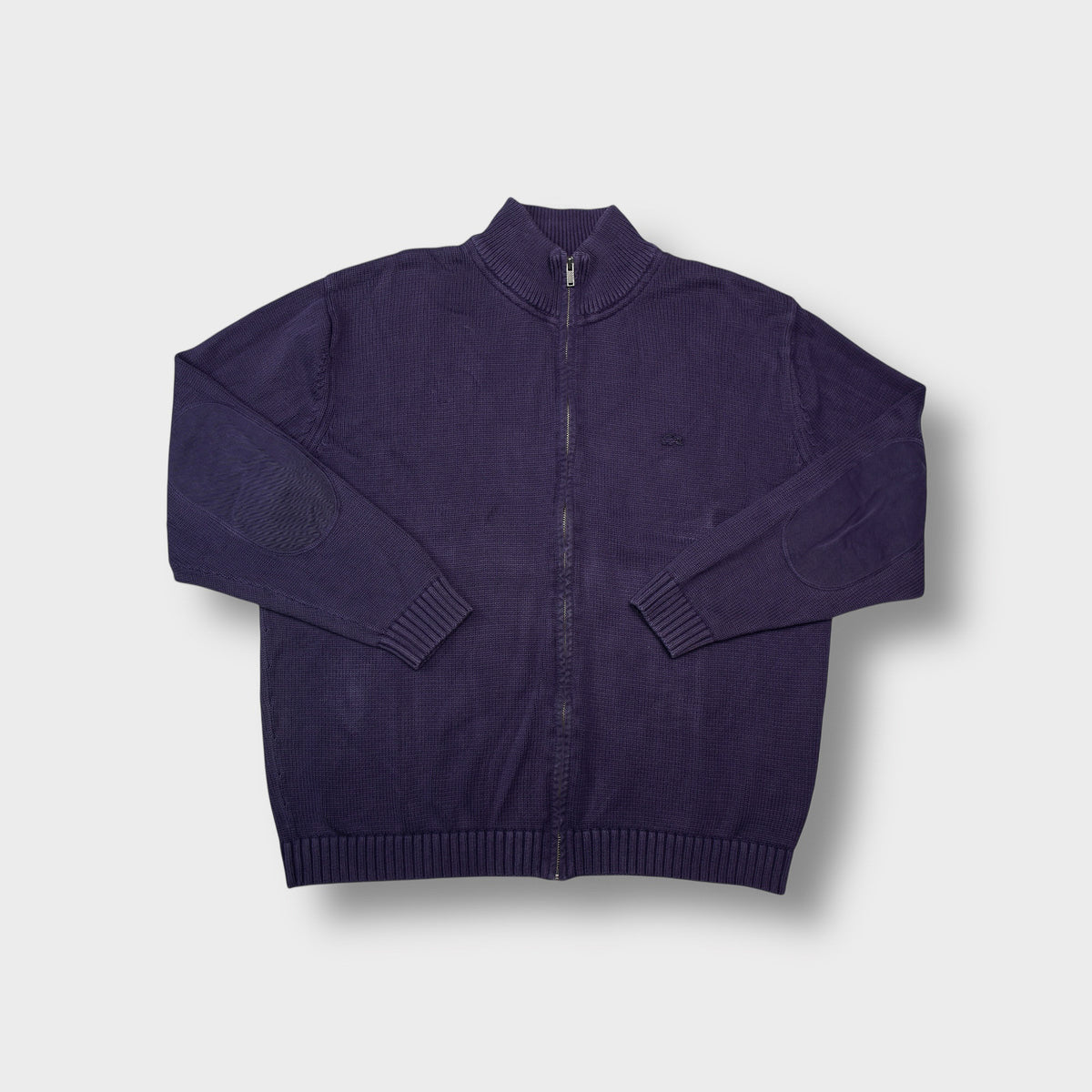 Lacoste full-zip knit jacket in purple featuring tone-on-tone elbow patches and a high collar.