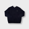 Lacoste crew-neck knit sweater in navy blue with a small embroidered crocodile logo patch
