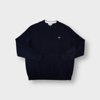 Lacoste crew-neck knit sweater in navy blue with a small embroidered crocodile logo patch