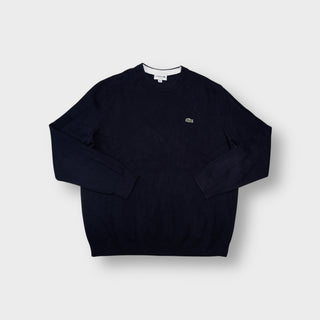 Lacoste crew-neck knit sweater in navy blue with a small embroidered crocodile logo patch