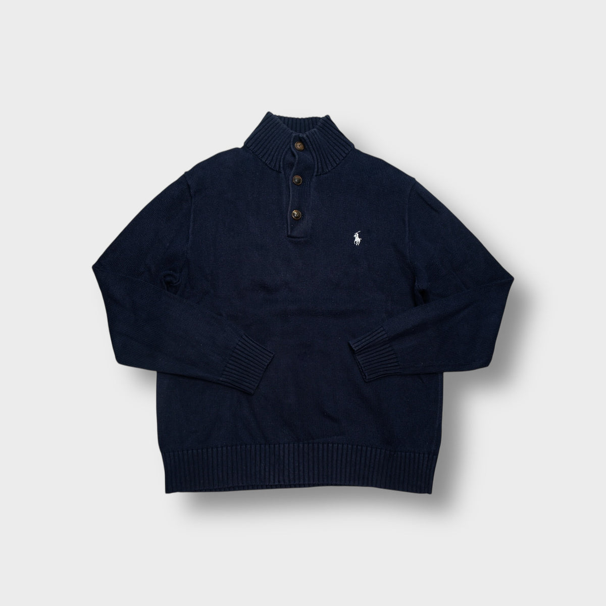 Ralph Lauren knit sweater in navy blue featuring a buttoned collar and pony logo