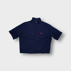 Ralph Lauren Polo Golf short-sleeve jacket in navy blue with Marbella Golf embroidery.