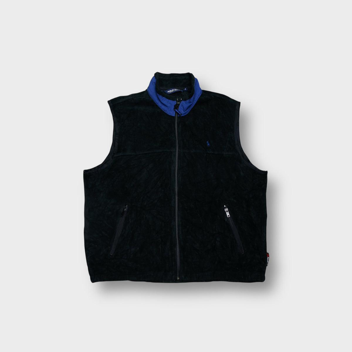 Ralph Lauren fleece vest in black featuring a blue inner collar lining