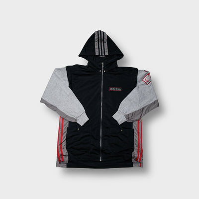 Black Adidas hooded jacket with grey contrast sleeves and red brand patch