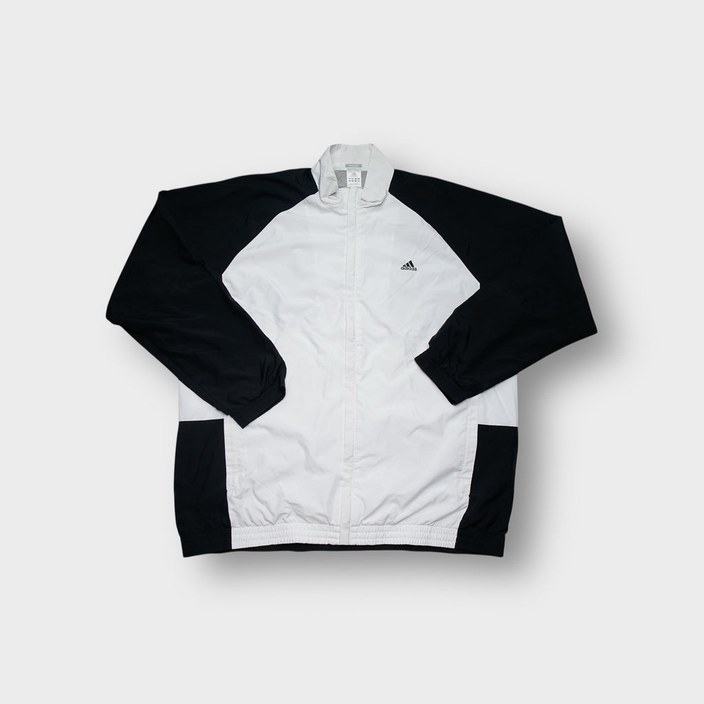 Adidas track jacket in white and black with embroidered chest logo and high collar