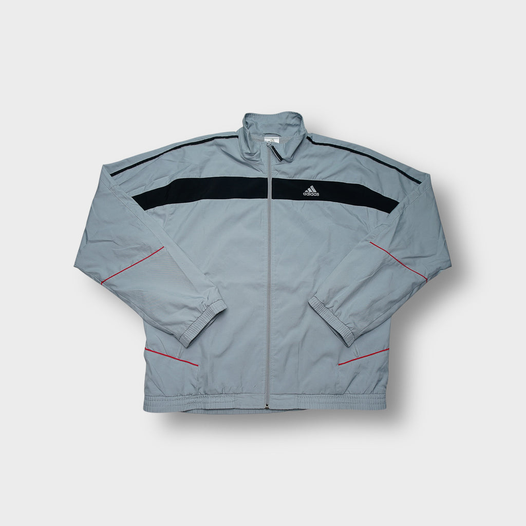 Adidas track jacket in grey featuring a black chest stripe and embroidered logo