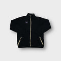 Black Nike fleece jacket with embroidered purple W chest logo and tan zip trim.