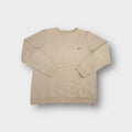 Nike sweater in beige featuring a small black embroidered swoosh on the chest
