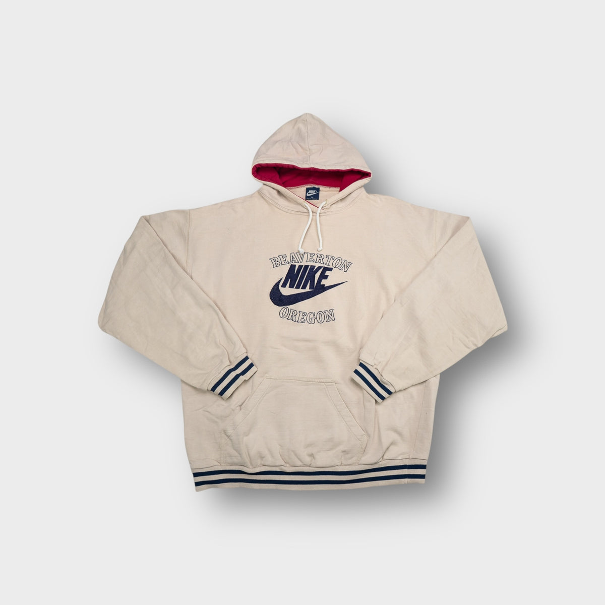 Nike beige hoodie with embroidered Beaverton Oregon swoosh chest logo