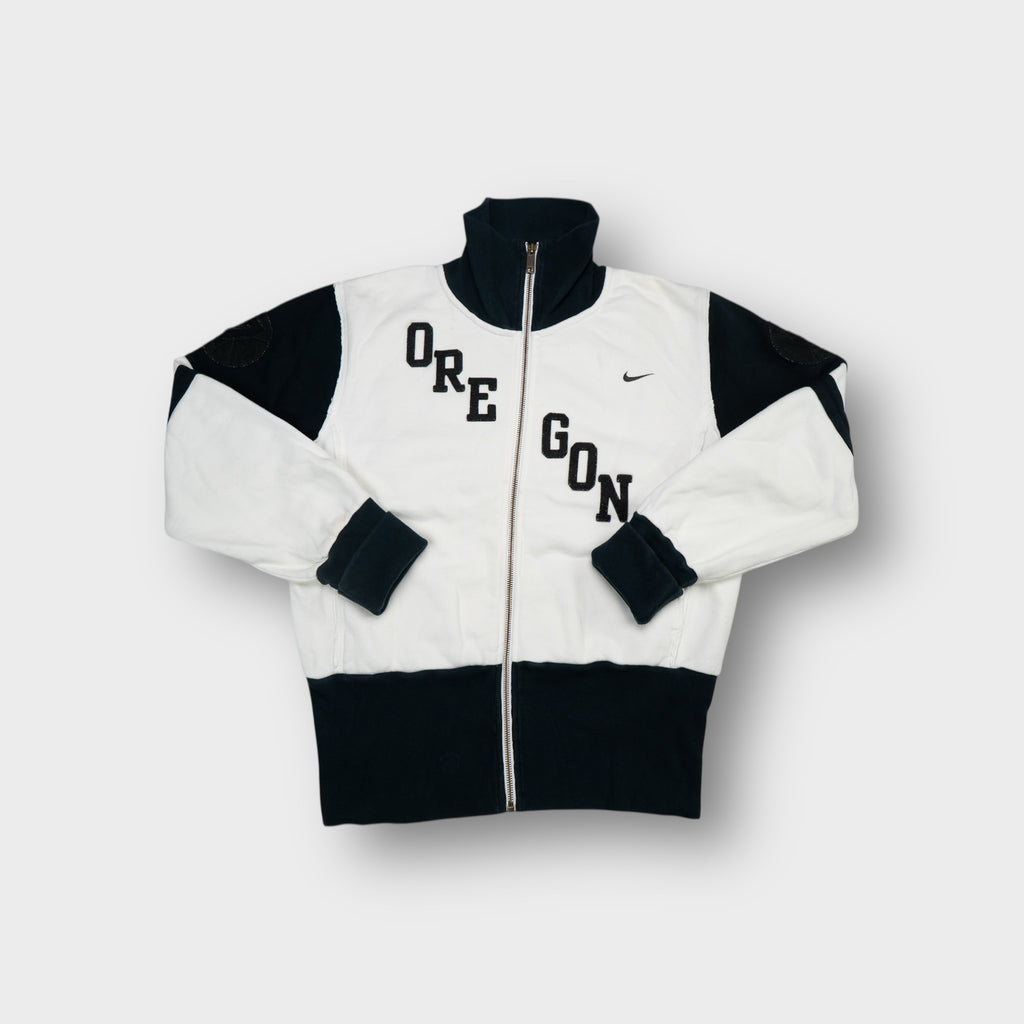 White Nike zip sweatjacket with black Oregon chest lettering and high collar