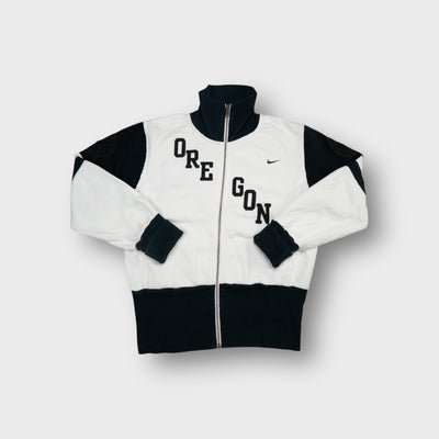 White Nike zip sweatjacket with black Oregon chest lettering and high collar