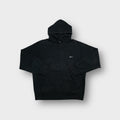 Black Nike hoodie featuring a small white embroidered swoosh logo on the front chest