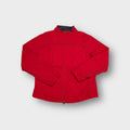 Red Nike track jacket with small embroidered swoosh and contrasting trim detail