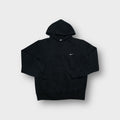 Nike pullover hoodie in black featuring small white embroidered swoosh on left chest