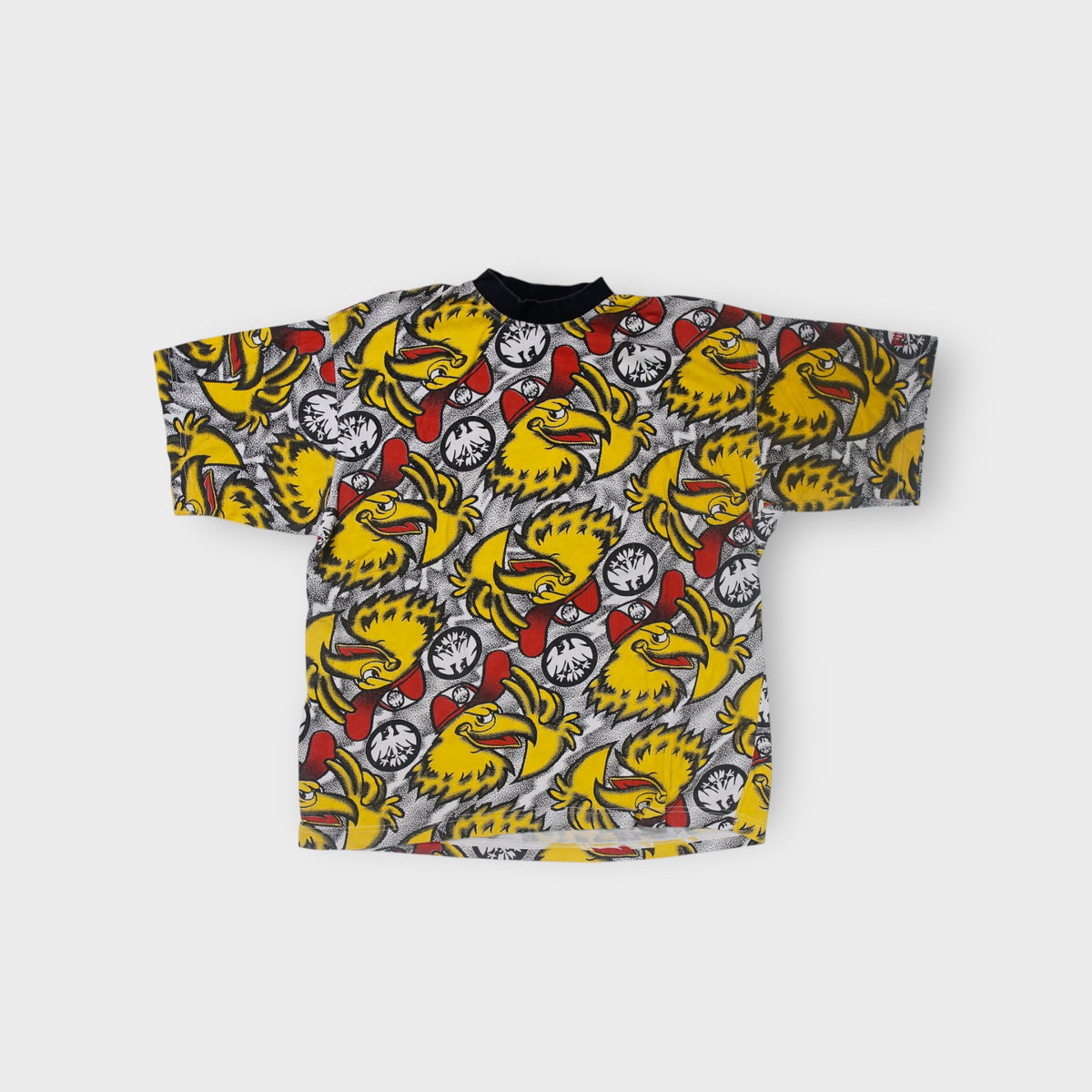 Puma T-Shirt with multicolor Eintracht Frankfurt mascot all-over print and black collar