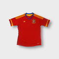 Adidas red Spain football jersey with woven national crest and yellow stripes
