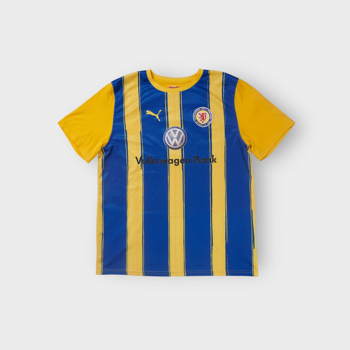 Puma Eintracht Braunschweig jersey in yellow and blue with club crest and sponsor print