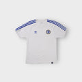 Adidas Chelsea shirt in white featuring blue shoulder stripes and woven crest patch